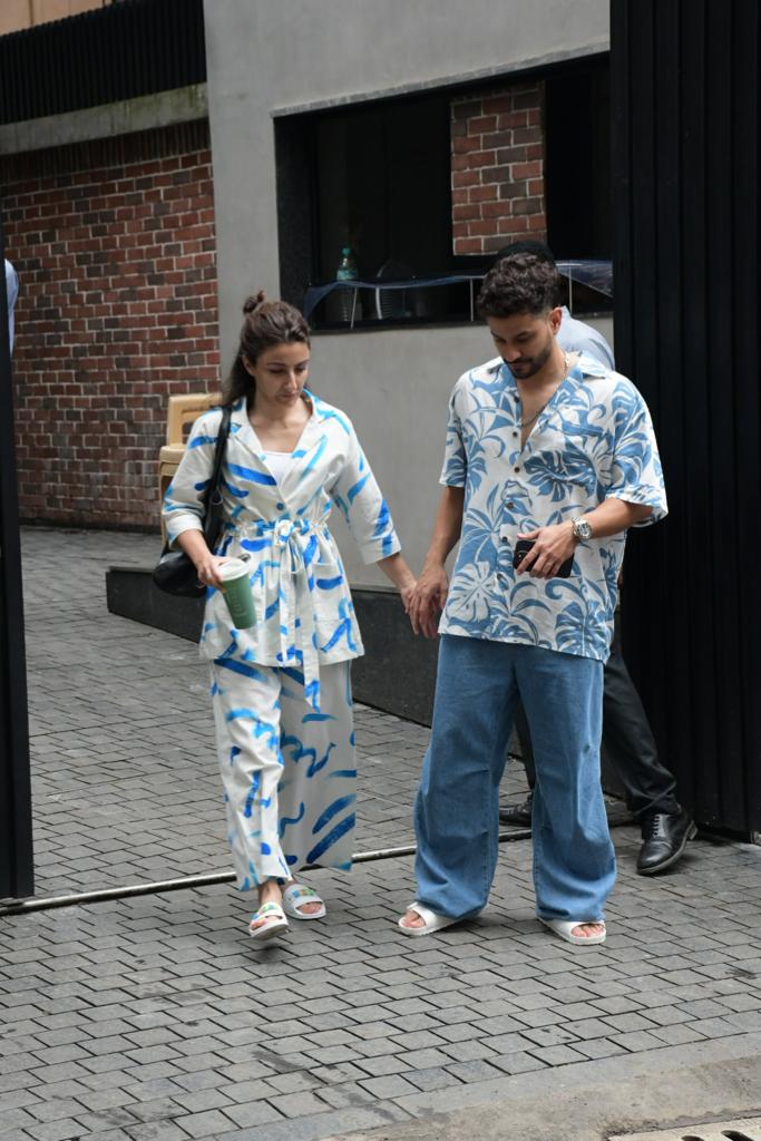 Walking hand in hand, the couple exuded an aura of togetherness and affection that melted hearts and captured the essence of their beautiful relationship.